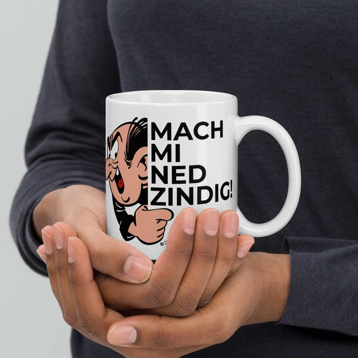 Hände halten ®Die Schlümpfe Tasse Mach mi ned zindig mit Papa Schlumpf Motiv und Aufschrift