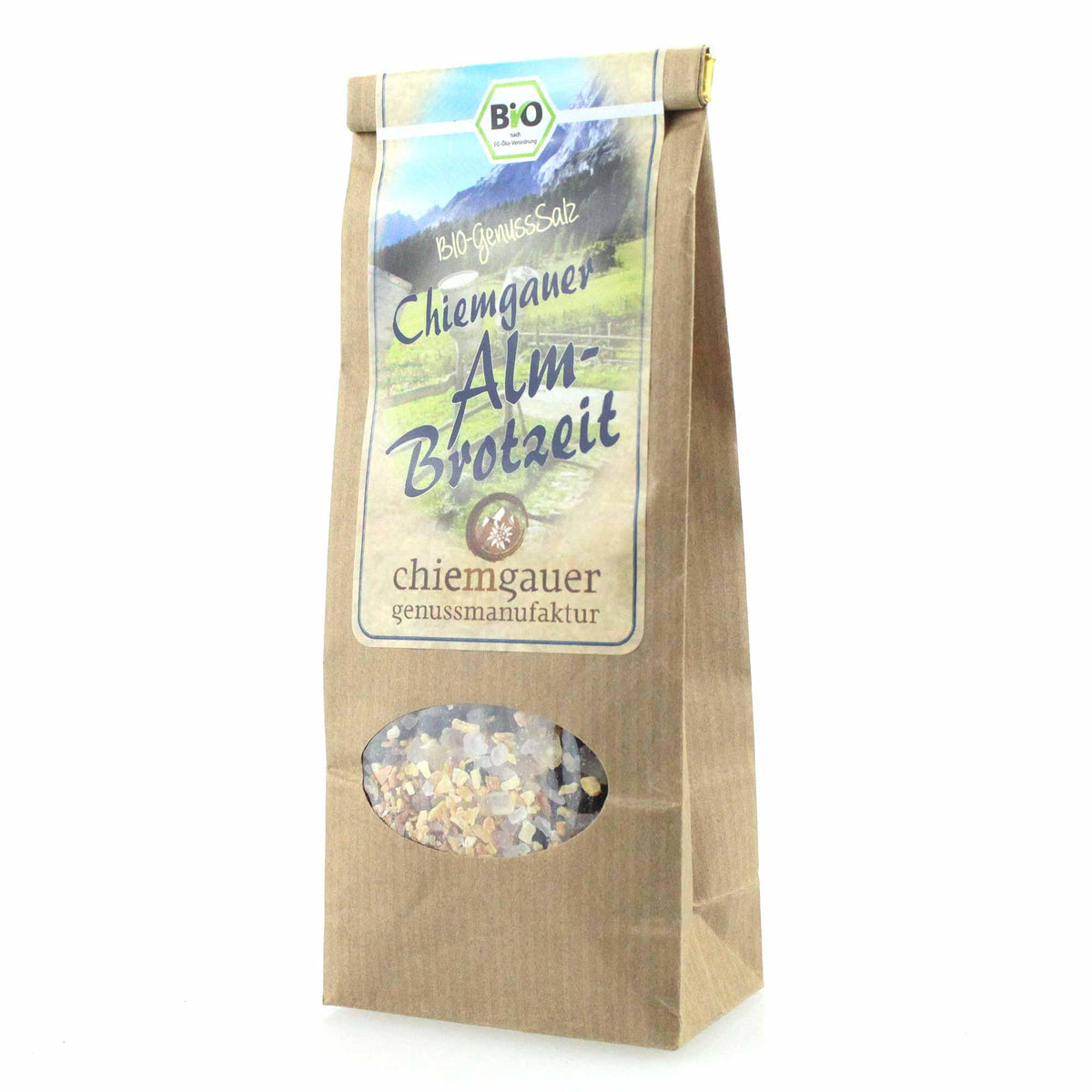 Biologisches Chiemgauer Alm-Brotzeit Genuss-Salz in umweltfreundlicher Papiertüte als Teil der Geschenkbox "Boarische Wellness".