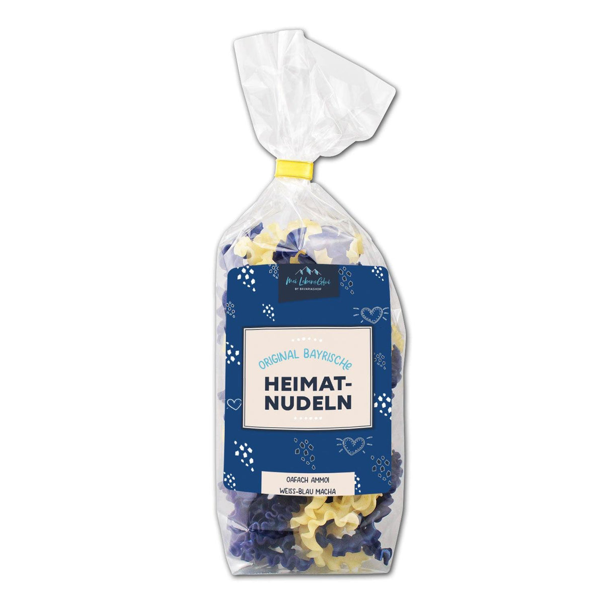Hausgemachte Dinkel-Nudeln in Schleifenform, zweifarbig in Weiß und Blau durch Spirulina-Alge gefärbt.