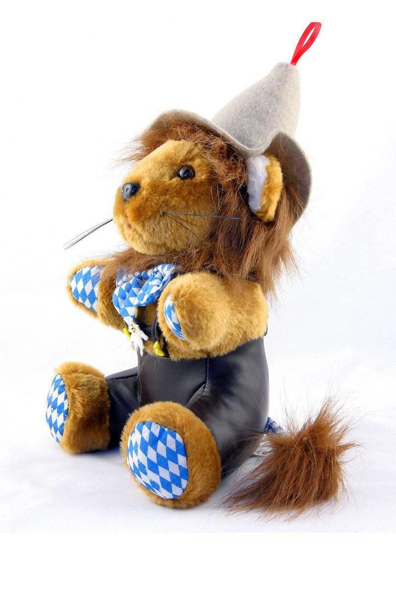 Braunes Plüsch-Löwen-Stofftier mit bayerischer Tracht, dazu Hosenträger und Filzhut