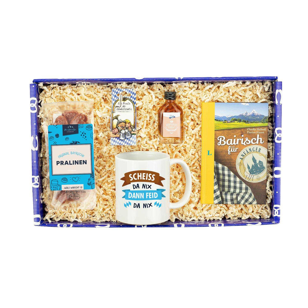 Geschenkbox Für Zuagroaste mit bayerischen Pralinen, Spruch-Tasse, "Bairisch für Anfänger" Buch und Likör.