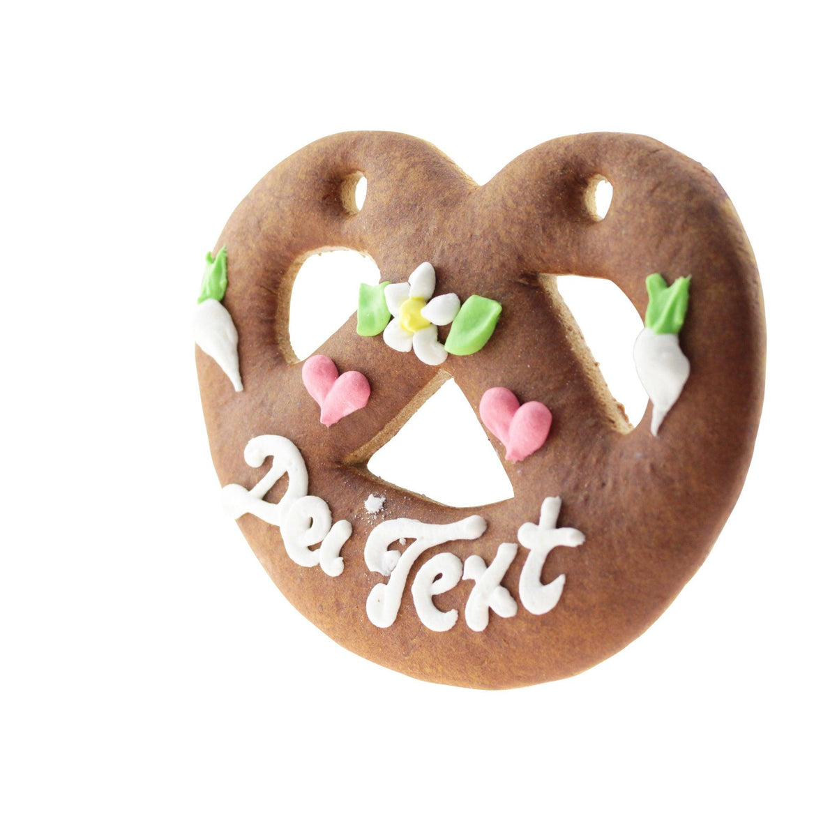 Herzförmiges Lebkuchenherz mit weißer Zuckergussaufschrift "Der Text" und bunten Dekorationen wie Blümchen und Radieschen.