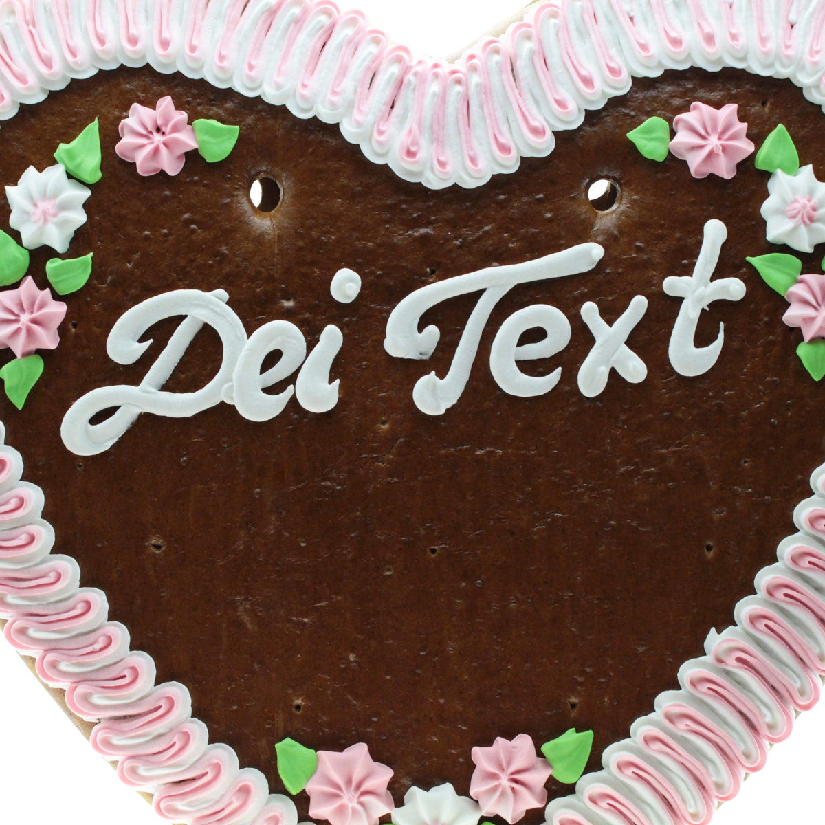 Braunes Lebkuchenherz mit weißer und rosa Zuckerguss-Verzierung, Blümchen und Platz für Wunschtext.
