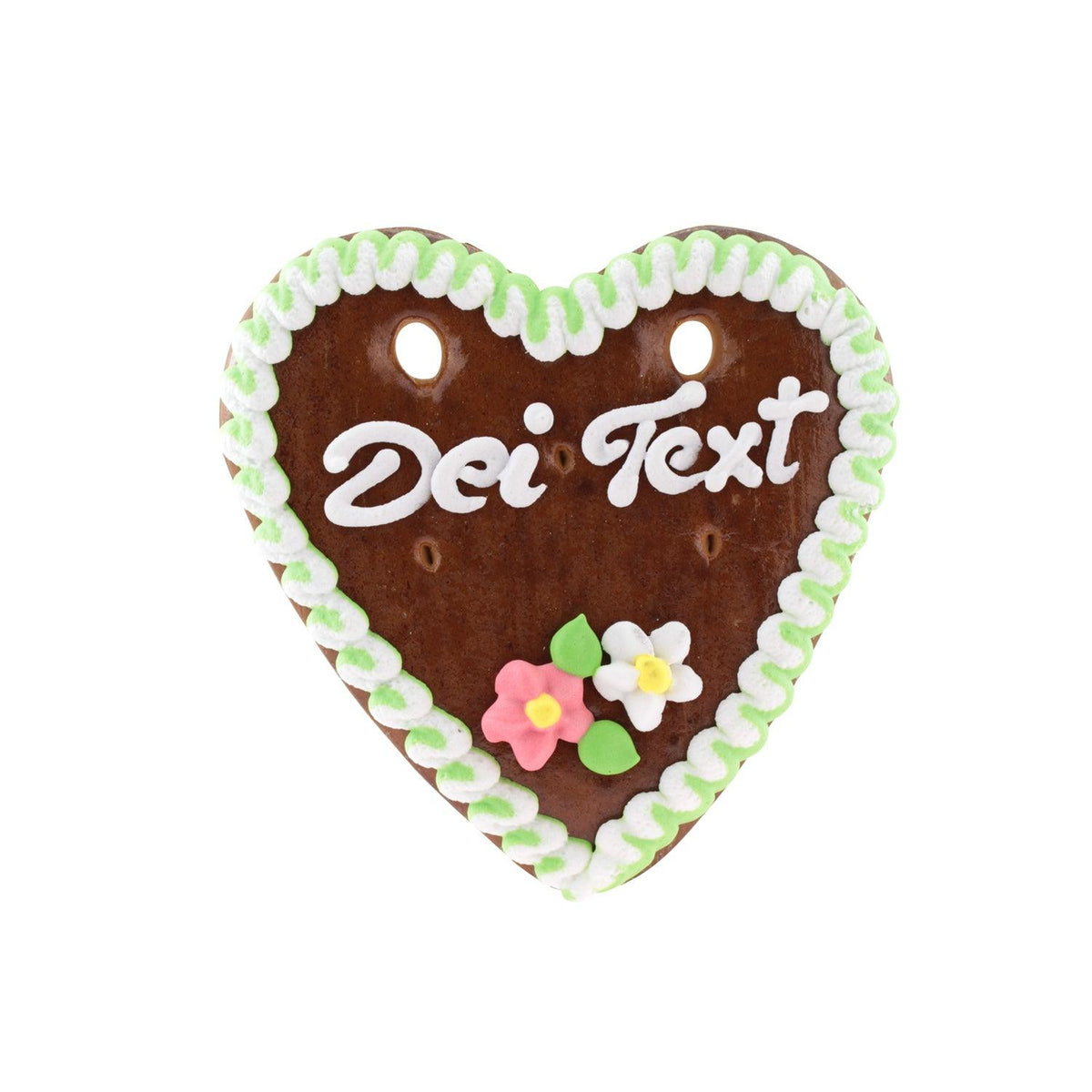 Braunbraunes Lebkuchenherz mit weißer Glasur, grünen und weißen Wellenrändern, "Dei Text" Schriftzug und kleinen Blüten.