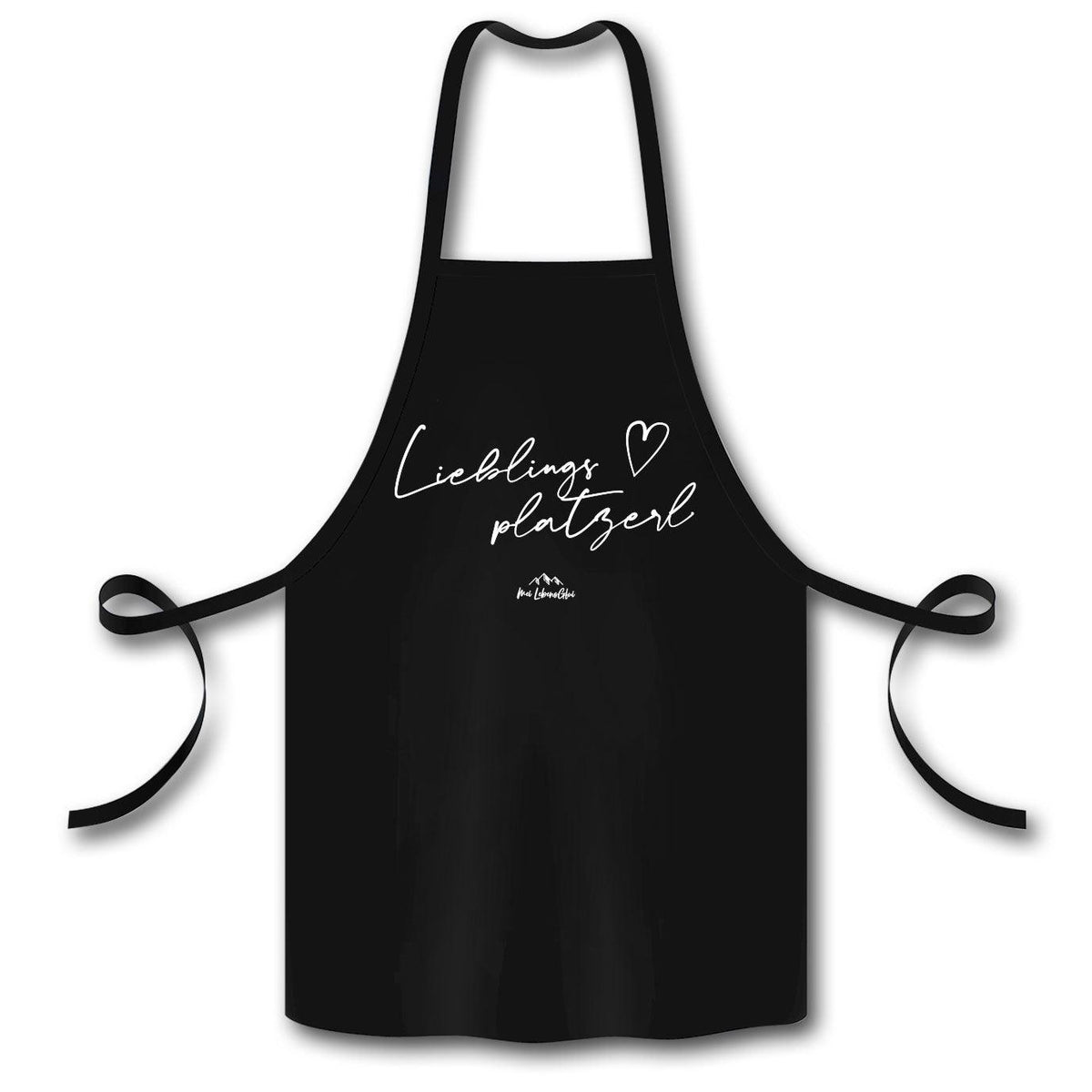 Schwarze Baumwoll-Kochschürze Lieblingsplatzerl mit weißem Schriftzug und Bergmotiv zum Kochen und Grillen.
