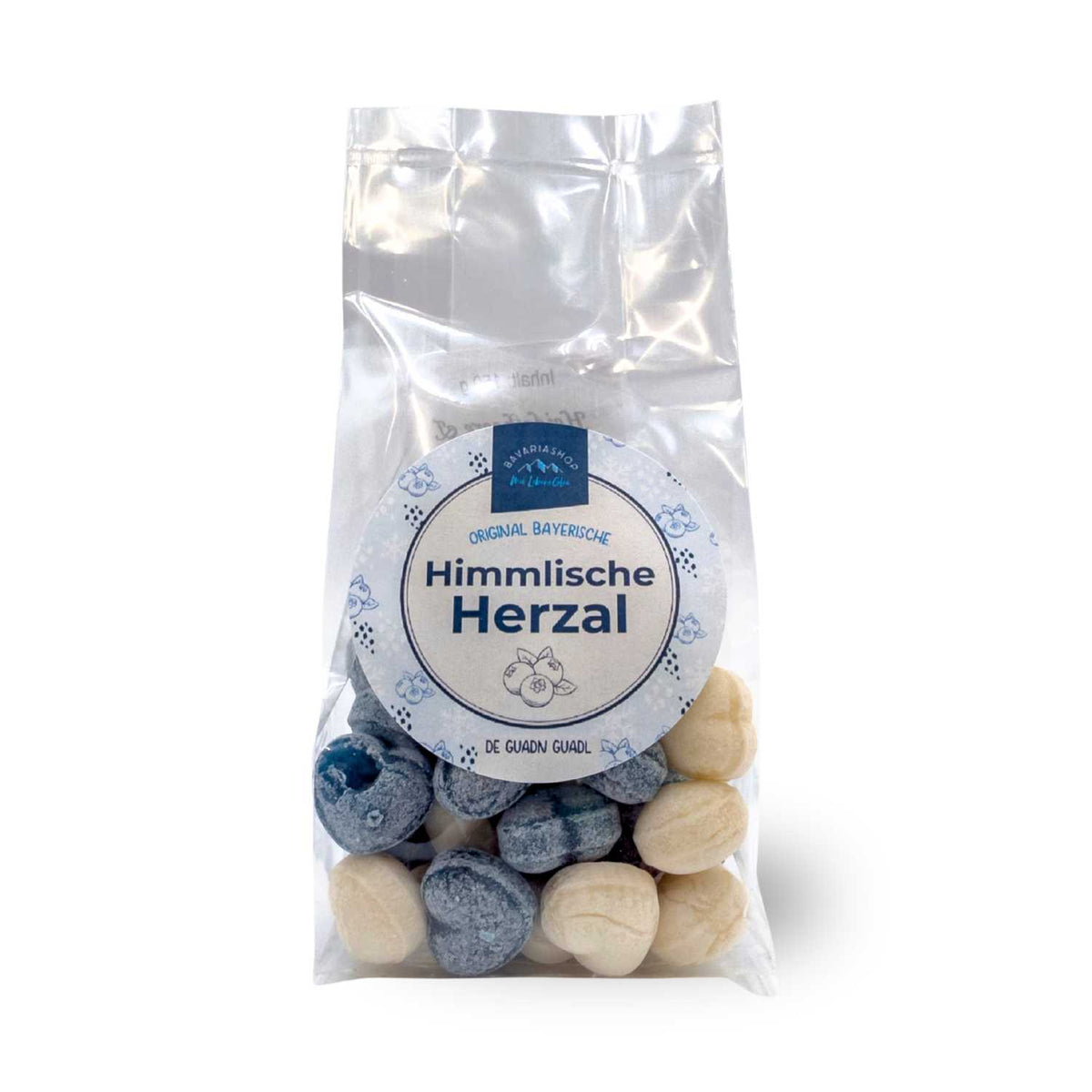 Transparente Tüte "Himmlische Herzal - Guadl" mit blauen und cremefarbenen herzförmigen Bonbons, bayerische Süßigkeit