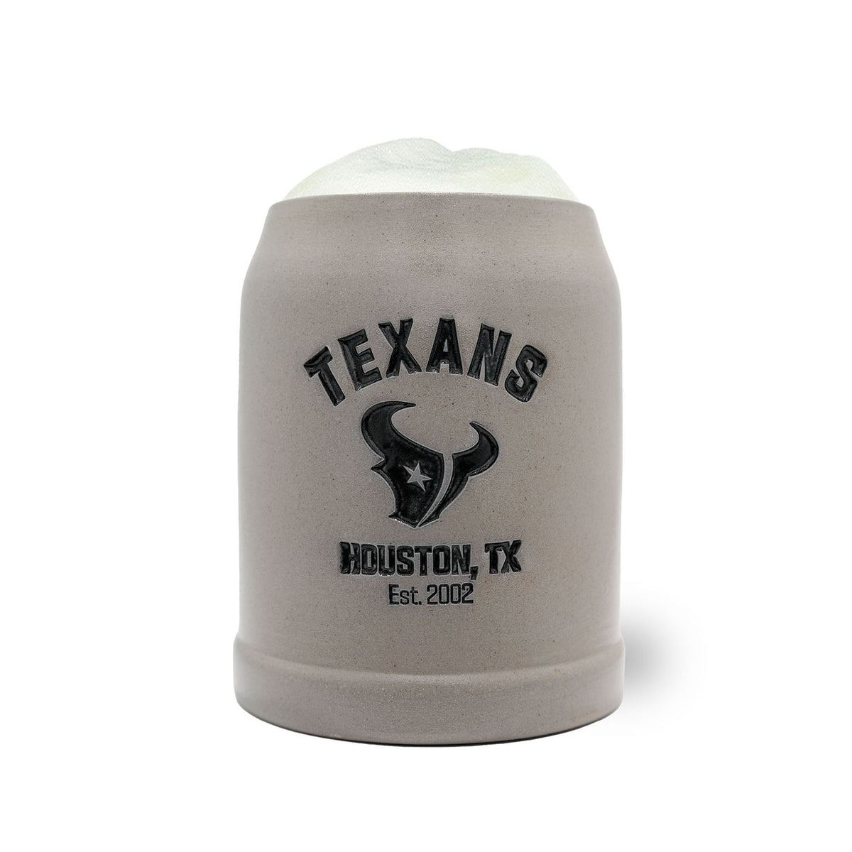 NFL PREMIUM Teamkrug Houston Texans aus grauem Steinzeug mit schwarzem Texans Logo und Schriftzug, gefüllt mit Bierschaum.
