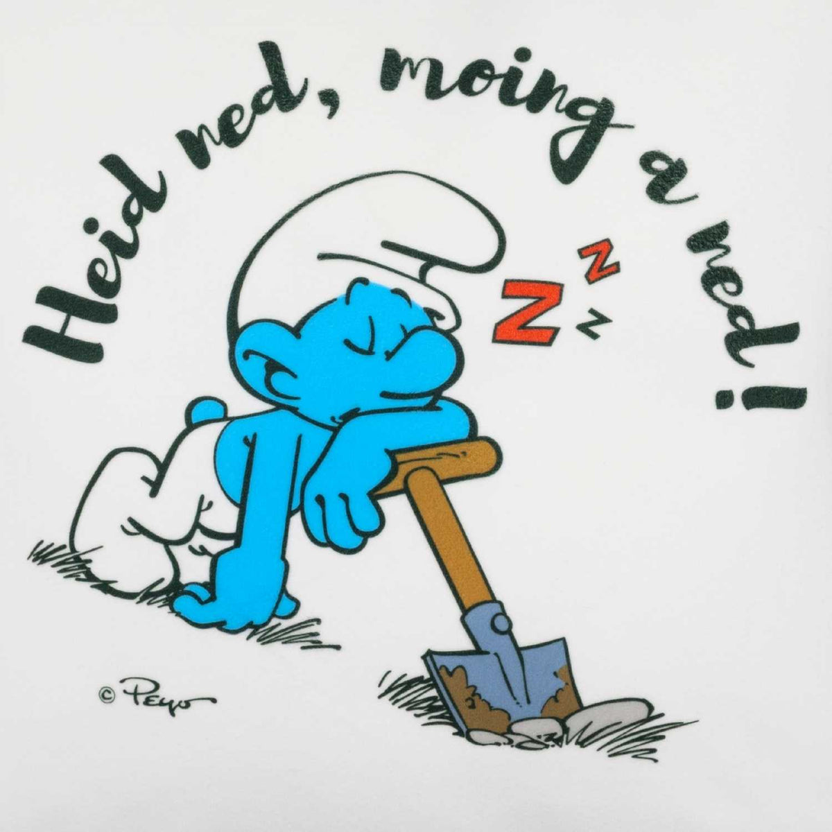 Die Schlümpfe Heid ned, moing a ned! Kuschelkissen mit schlafendem Schlumpf, der auf einer Schaufel lehnt und "ZzZ" Blasen hat.