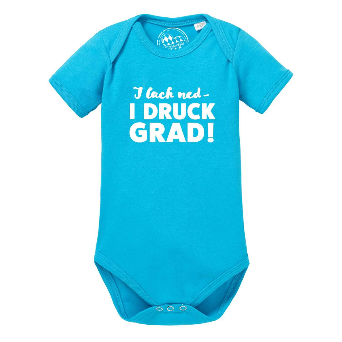 Türkiser Baby Body I lach ned… mit weißem Spruch "I lach ned - I druck grad!" und Druckknöpfen.
