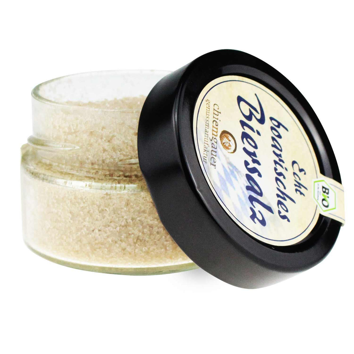 Grobes, hellbeiges Steinsalz mit sichtbaren Kräuterstückchen, verfeinert mit bayerischem Hefeweißbier, 140 g.