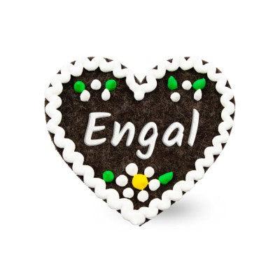 Brauner Filzherz-Anstecker "Engal" mit weißem Zuckerguss und bunten Blumenapplikationen.