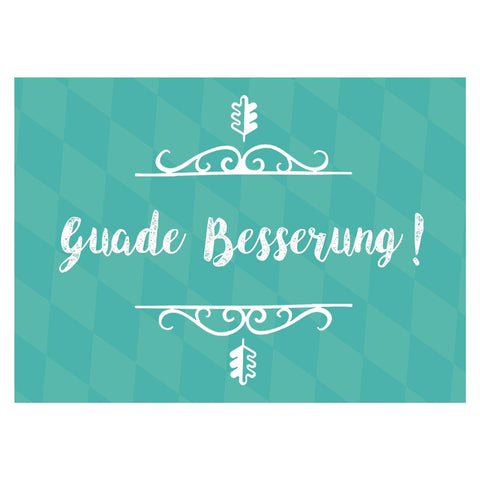 Grußkarte "Guade Besserung!" auf türkisem Hintergrund mit weißen Schnörkeln und Eichenblättern, im bayerischen Stil.