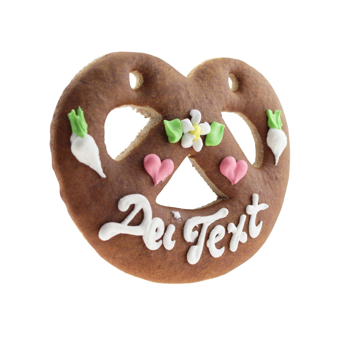 Braunes Lebkuchenherz mit weißer Zuckergussinschrift Dei Text, rosa Zuckergussherzen, Blumen und Radieschen.