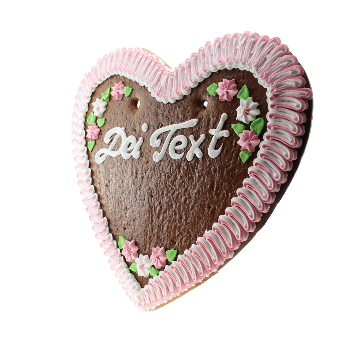 Lebkuchenherz mit rosa-weißem Zuckerguss und der Aufschrift "Dei Text", geschmückt mit Blumen.