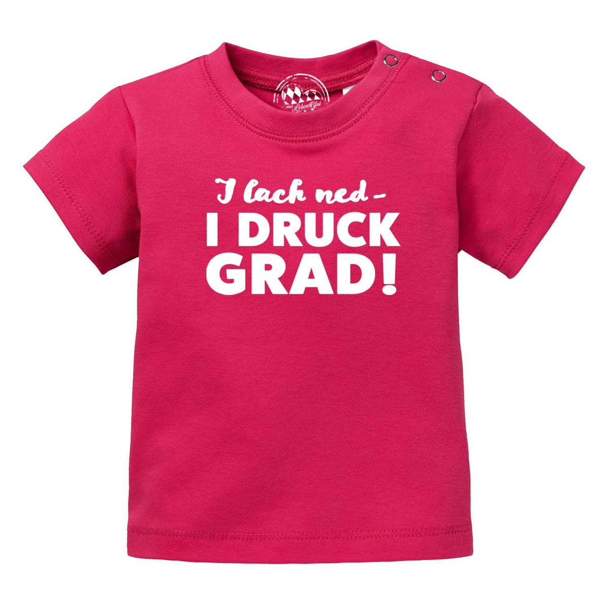 Baby T-Shirt "I lach ned..." in leuchtendem Pink mit weißem Spruchdruck und praktischen Druckknöpfen.