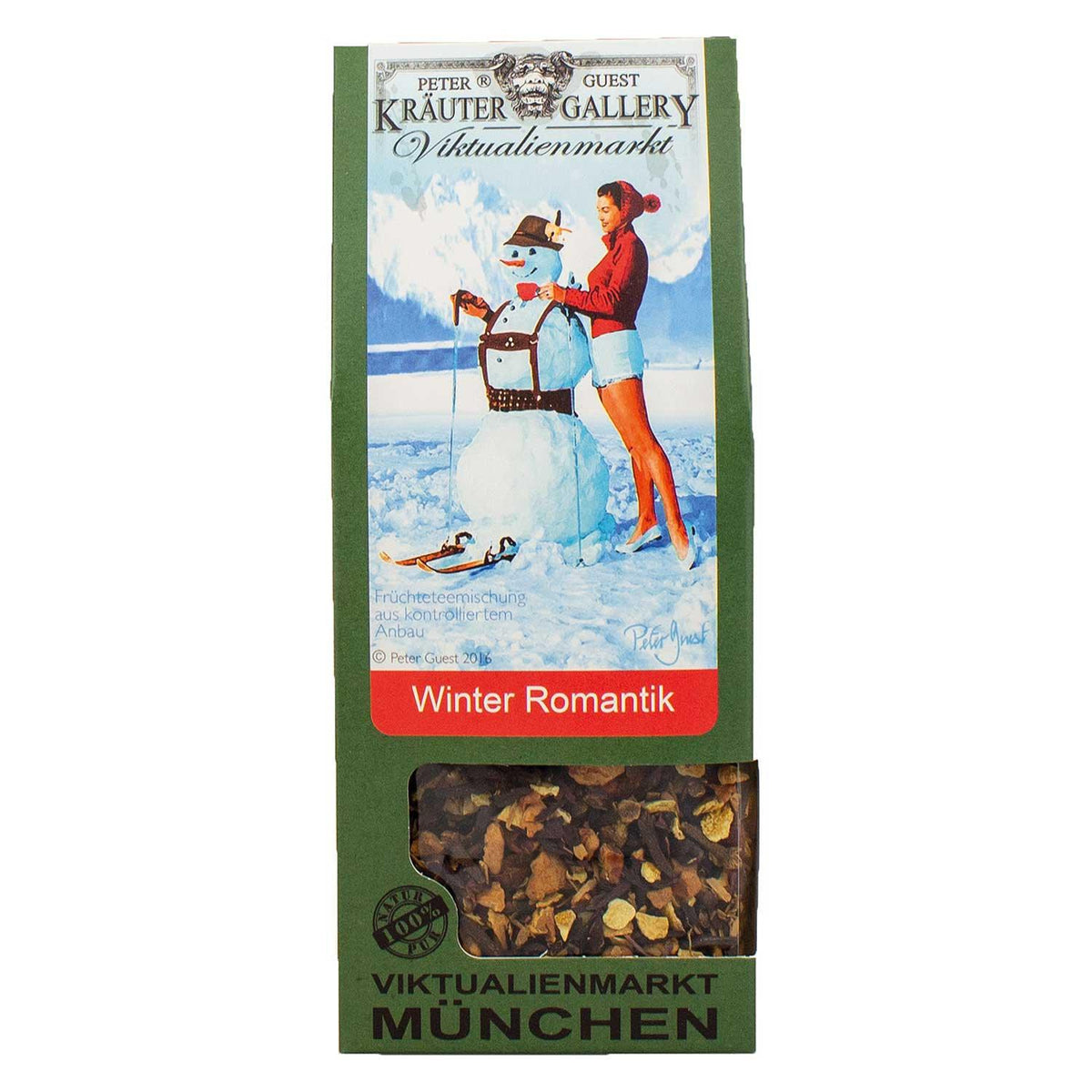 Weihnachtsbox Tannenbaam mit Früchtetee, grüner Verpackung und winterlichem Ski-Motiv.